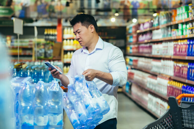 a man buys water to prepare for a storm